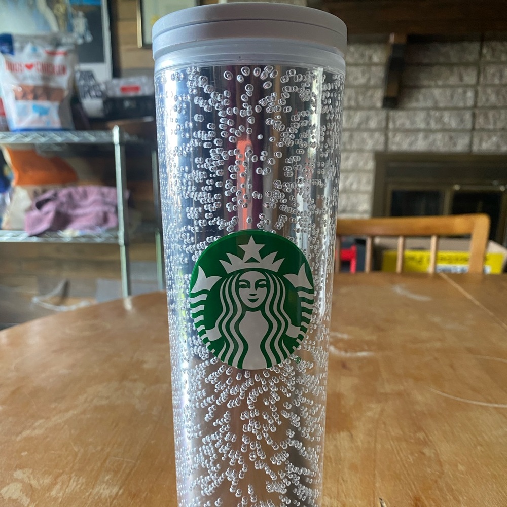 Starbucks travel mug.